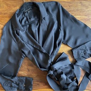 Banana Republic. Silky & flowy wrap style blouse. Size Medium. Black. NWOT.